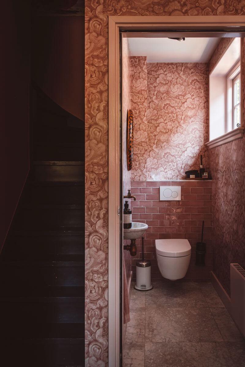 An Eclectic Colorful House in an Old Dutch Farmhouse 33 pink powder room An Eclectic Colorful House in an Old Dutch Farmhouse