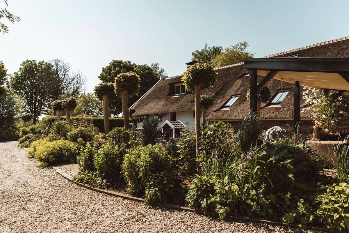 An Eclectic Colorful House in an Old Dutch Farmhouse 37 romantic garden
