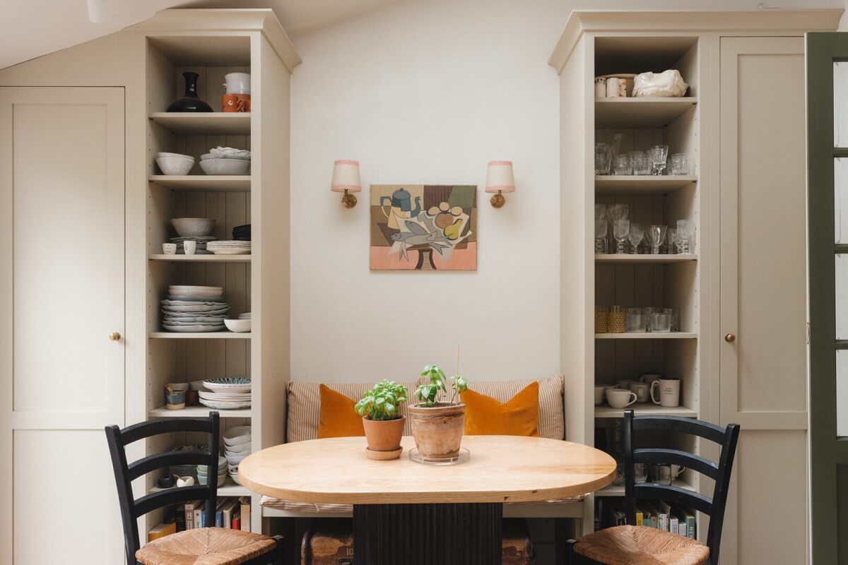 A Soft and Natural Color Palette in a Victorian Home 7 round kitchen table and built in shelves