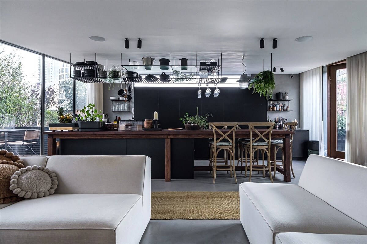 An Industrial, Loft-Style Duplex with Japanese Landscaped Roof Terraces 11 sitting room and ktichen