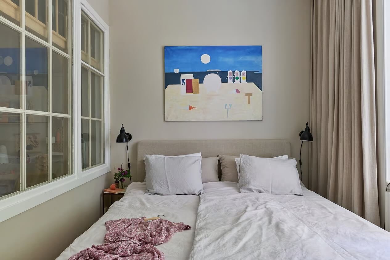 Soothing Colors and Smart Solutions in a Two Bedroom Apartment 12 small light gray bedroom with inner window