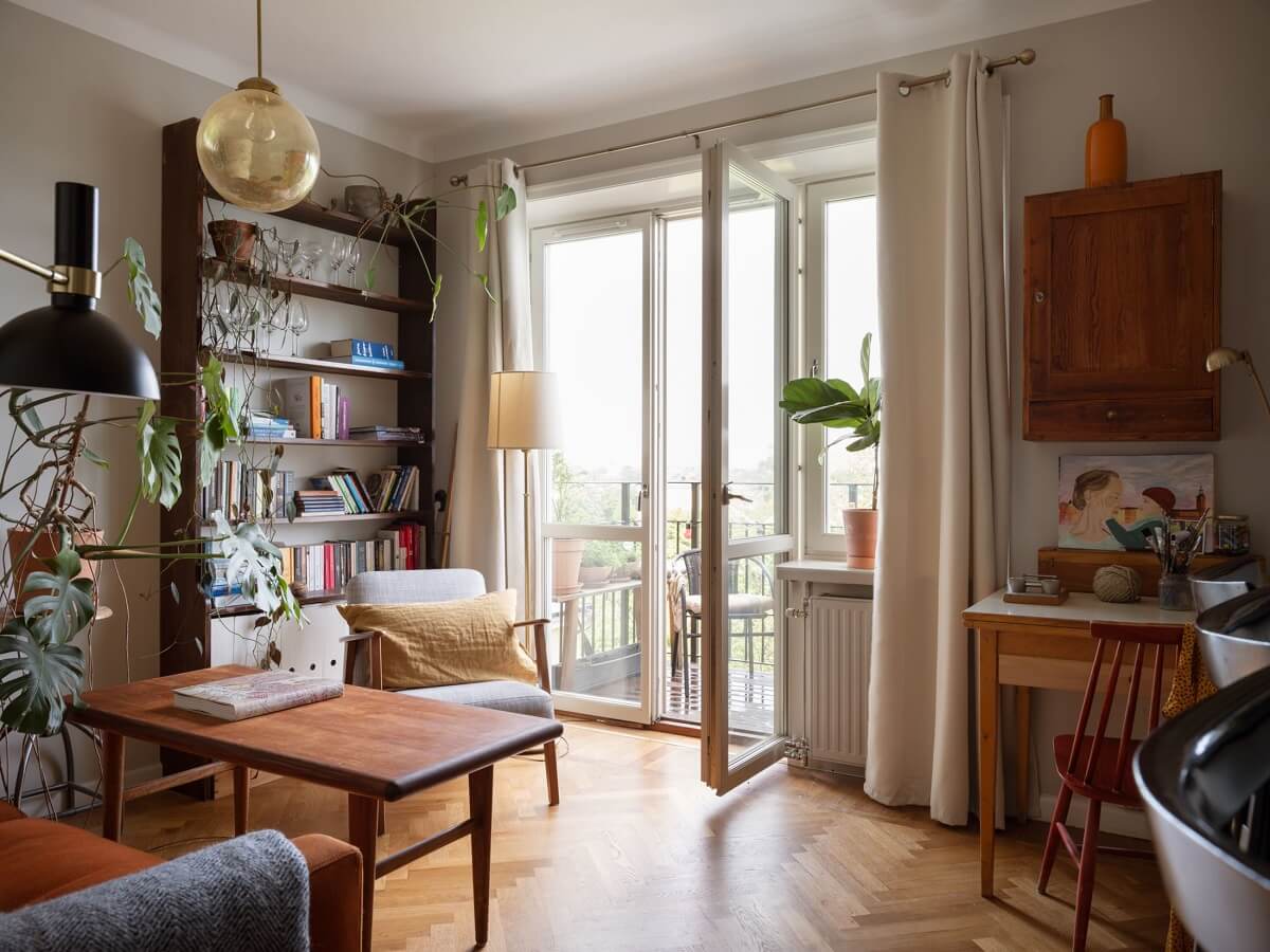 A Small Apartment with an Ochre Yellow Kitchen 4 small living room midcentury design balcony
