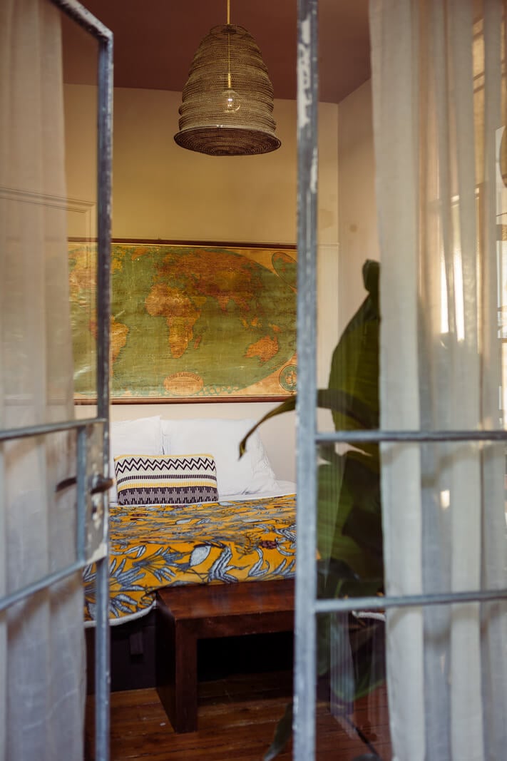 A Warm Ground Floor Apartment with Reclaimed Materials 13 steel doors bedroom
