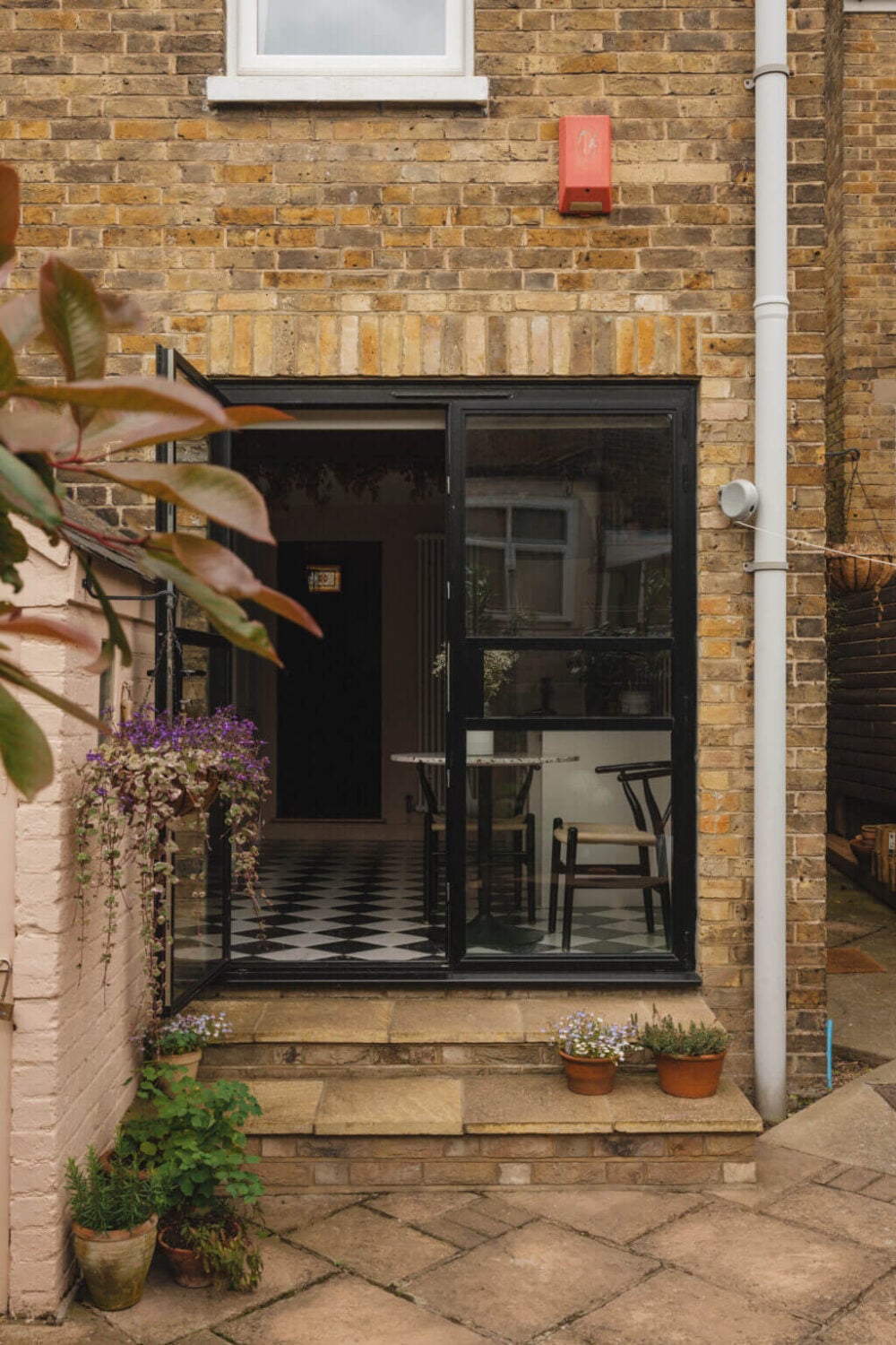 A Charming Victorian House with a Lovely Kitchen 21 steel framed glass doors