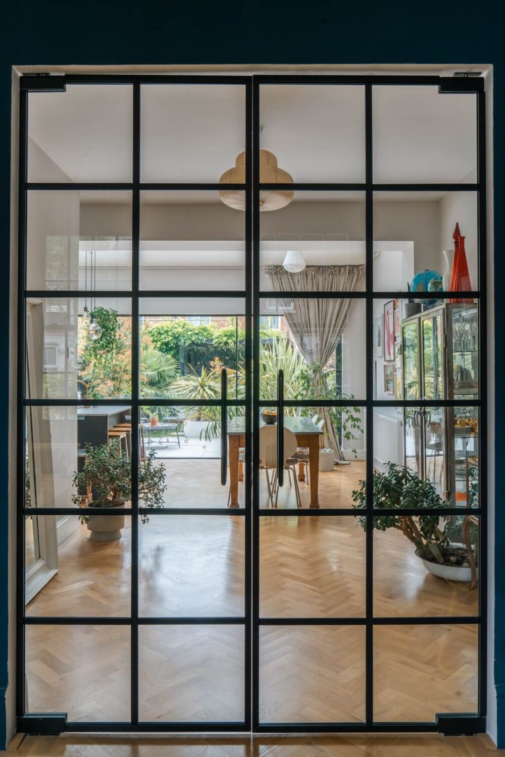 A Dark Blue Living Room in a Historic London Home 5 steel glass doors