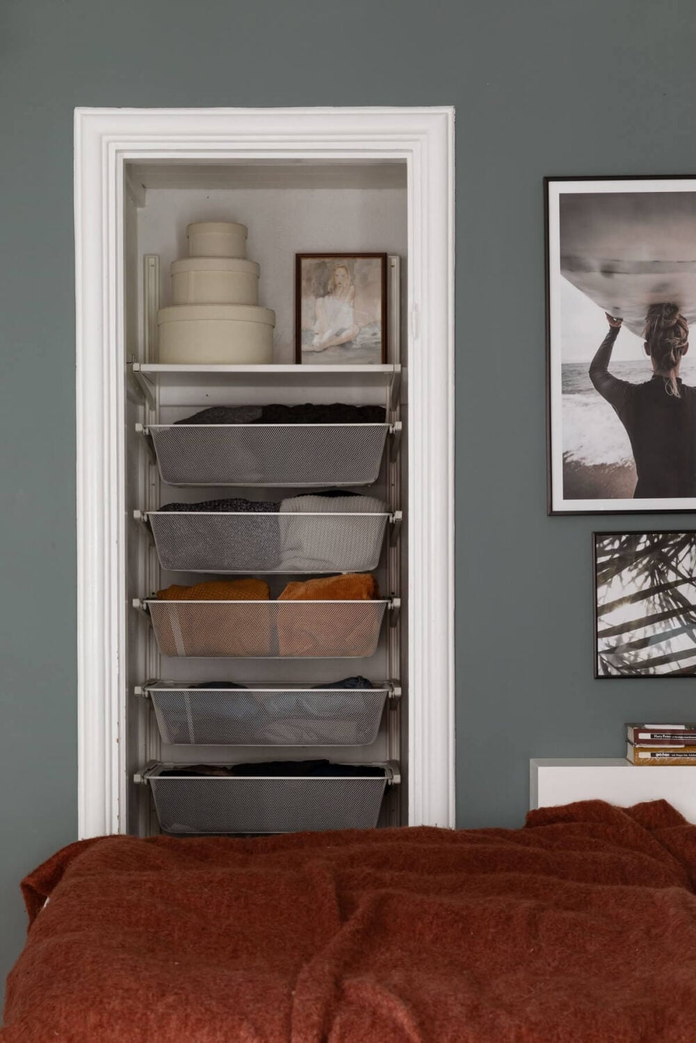 A Stockholm Studio Apartment with Warm Earthy Textiles 11 storage shelves studio apartment