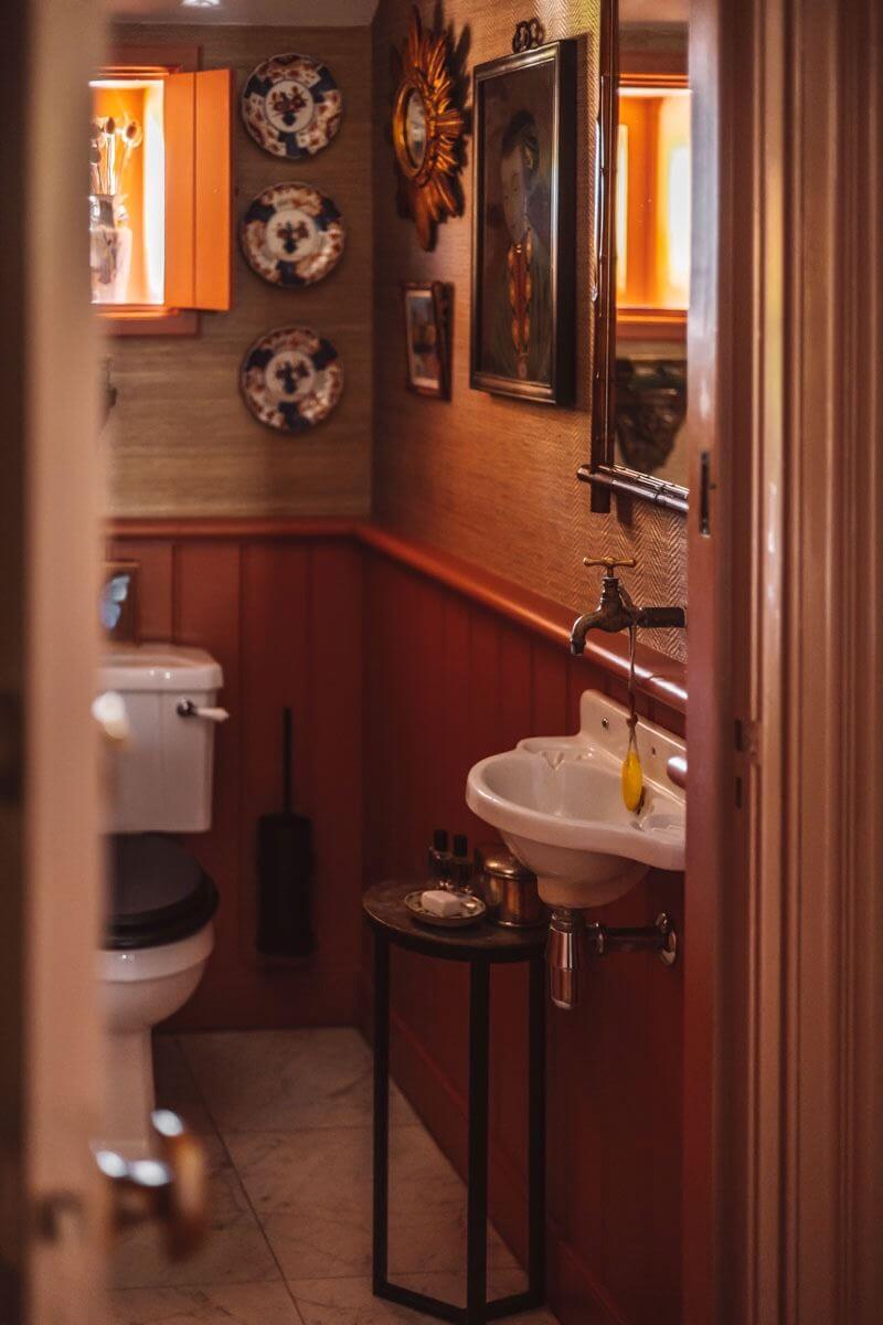 An Eclectic Colorful House in an Old Dutch Farmhouse 15 terracotta powder room