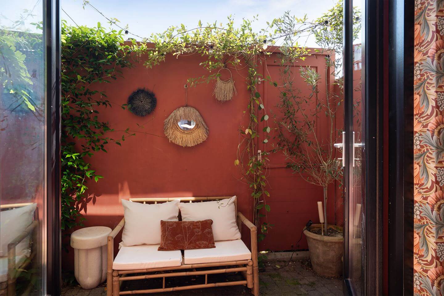 Rich Colors in a Charming Late 19th-Century Home in The Netherlands 4 tiny backyard garden terracotta colored wall nordroom Rich Colors in a Charming Late 19th-Century Home in The Netherlands