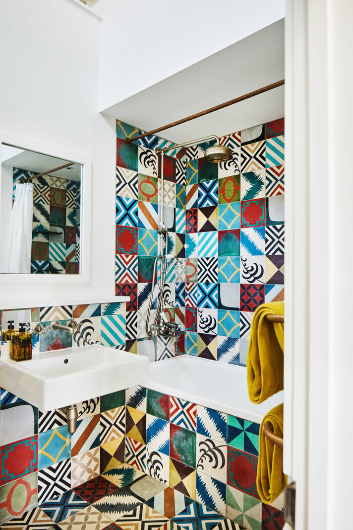 An Industrial and Colorful Warehouse Conversion in London 20 tiny bathroom with colorful tiles nordroom