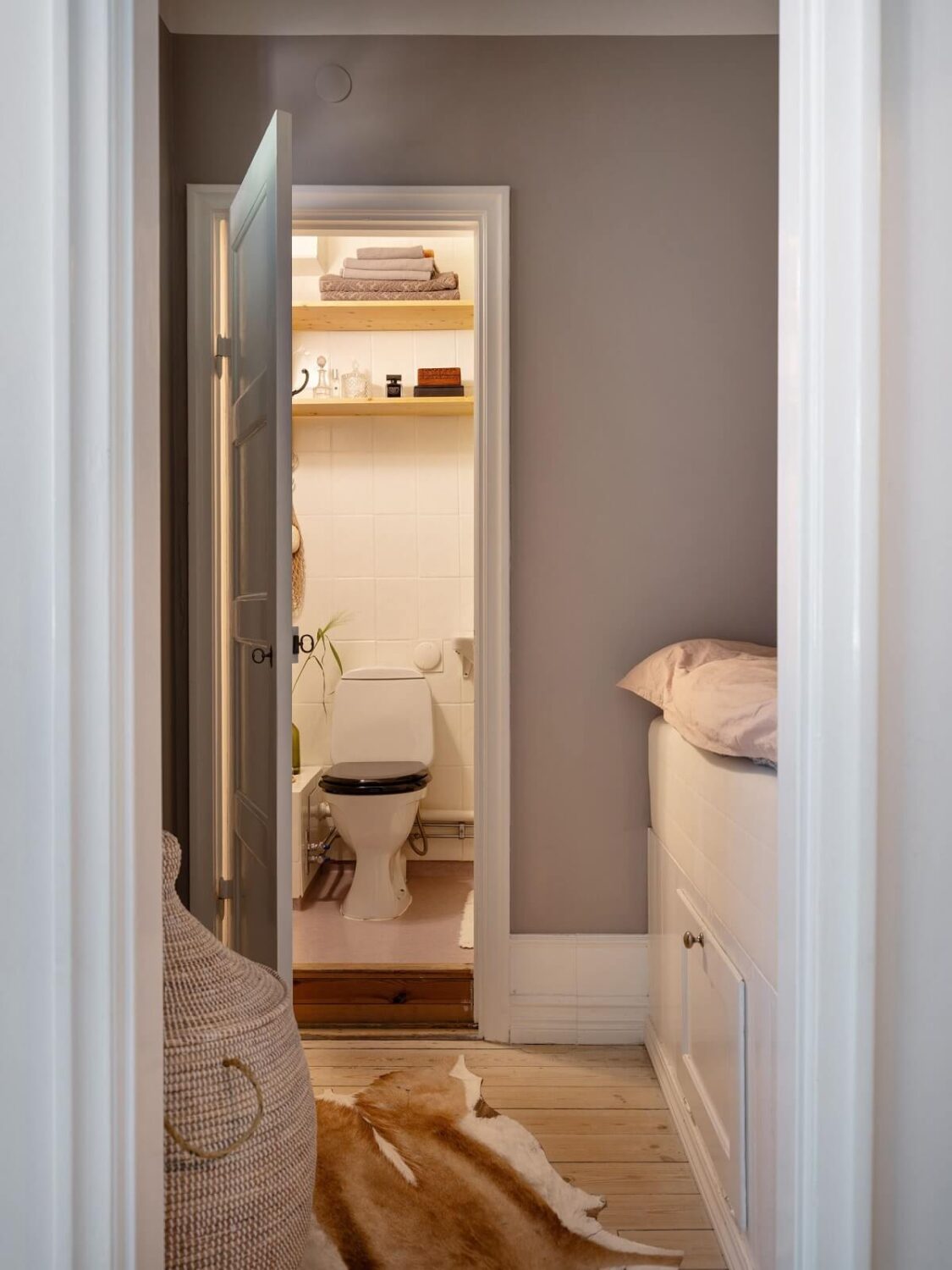 A Light and Well-Planned Apartment in Stockholm 16 tiny bedroom with storage bed