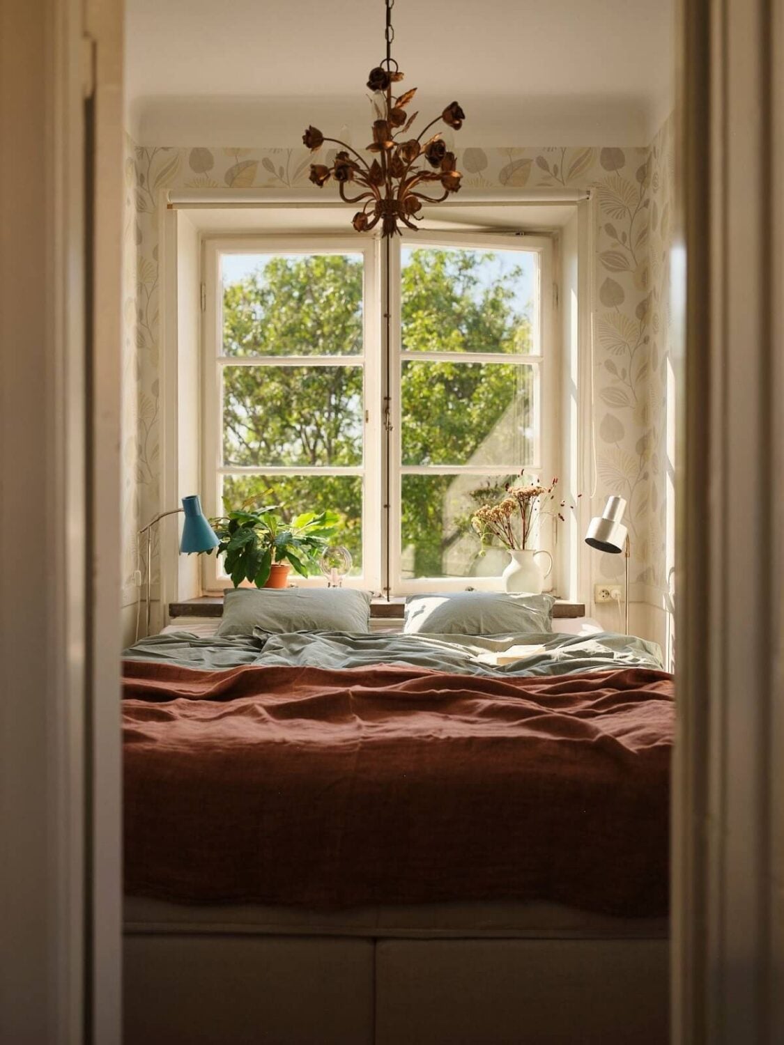 A Charming Small Two-Bedroom Apartment in Stockholm 15 tiny bedroom with wallpaper