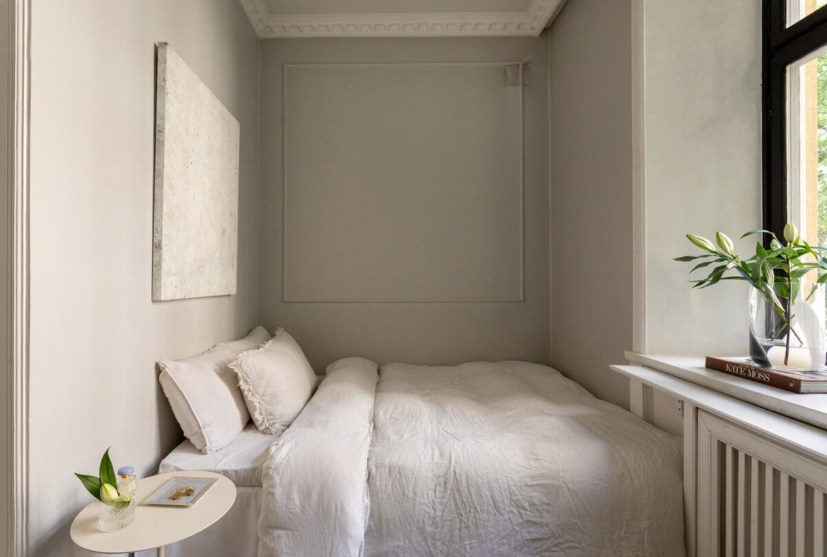 A Tiny Minimalistic Apartment in Stockholm 9 tiny gray bedroom