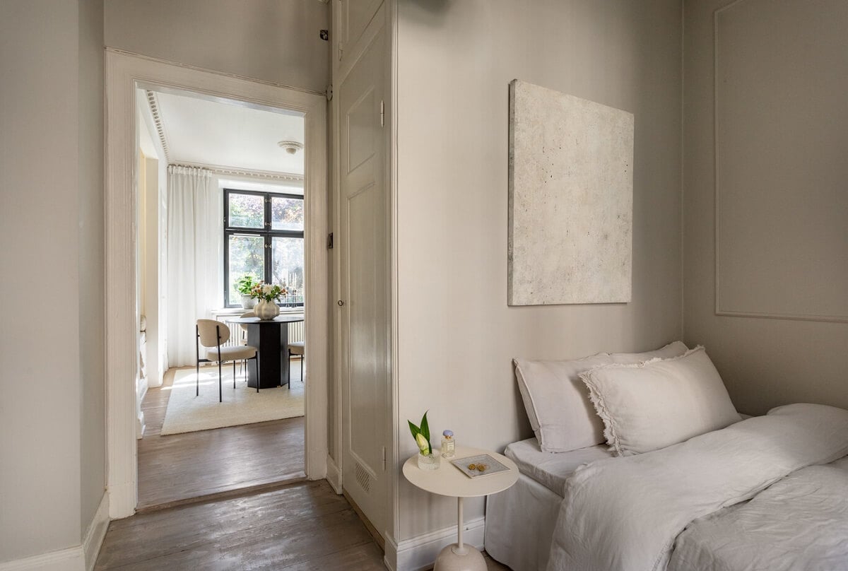 A Tiny Minimalistic Apartment in Stockholm 8 tiny gray bedroom minimalistic apartment