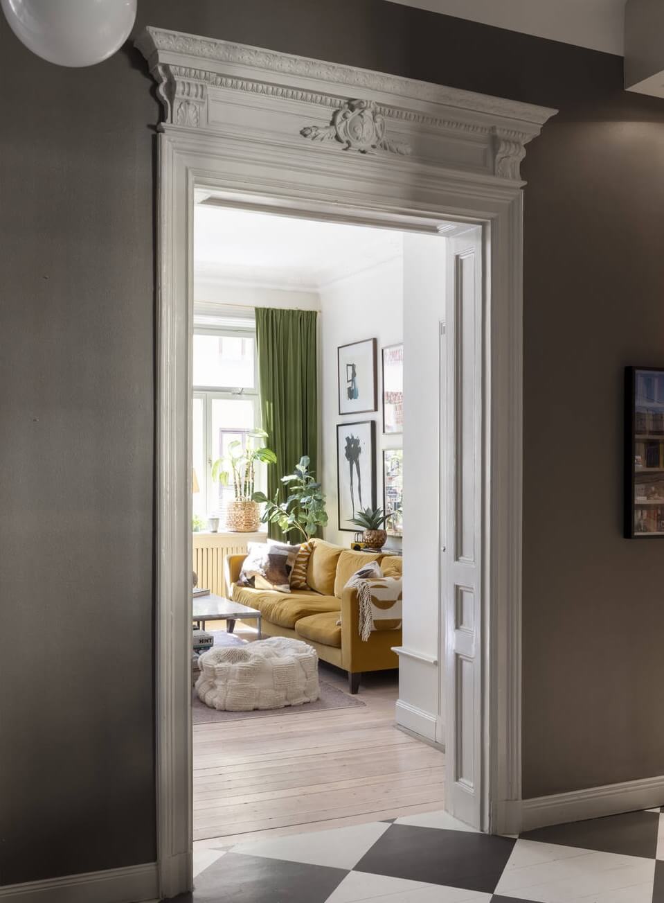 Bright, Spacious Rooms in a Classic Stockholm Apartment 9 view into sitting room