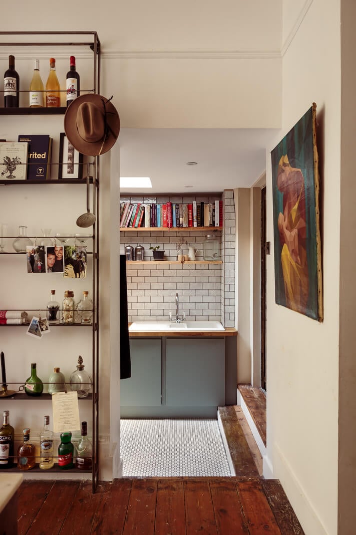 A Warm Ground Floor Apartment with Reclaimed Materials 9 view into utility room