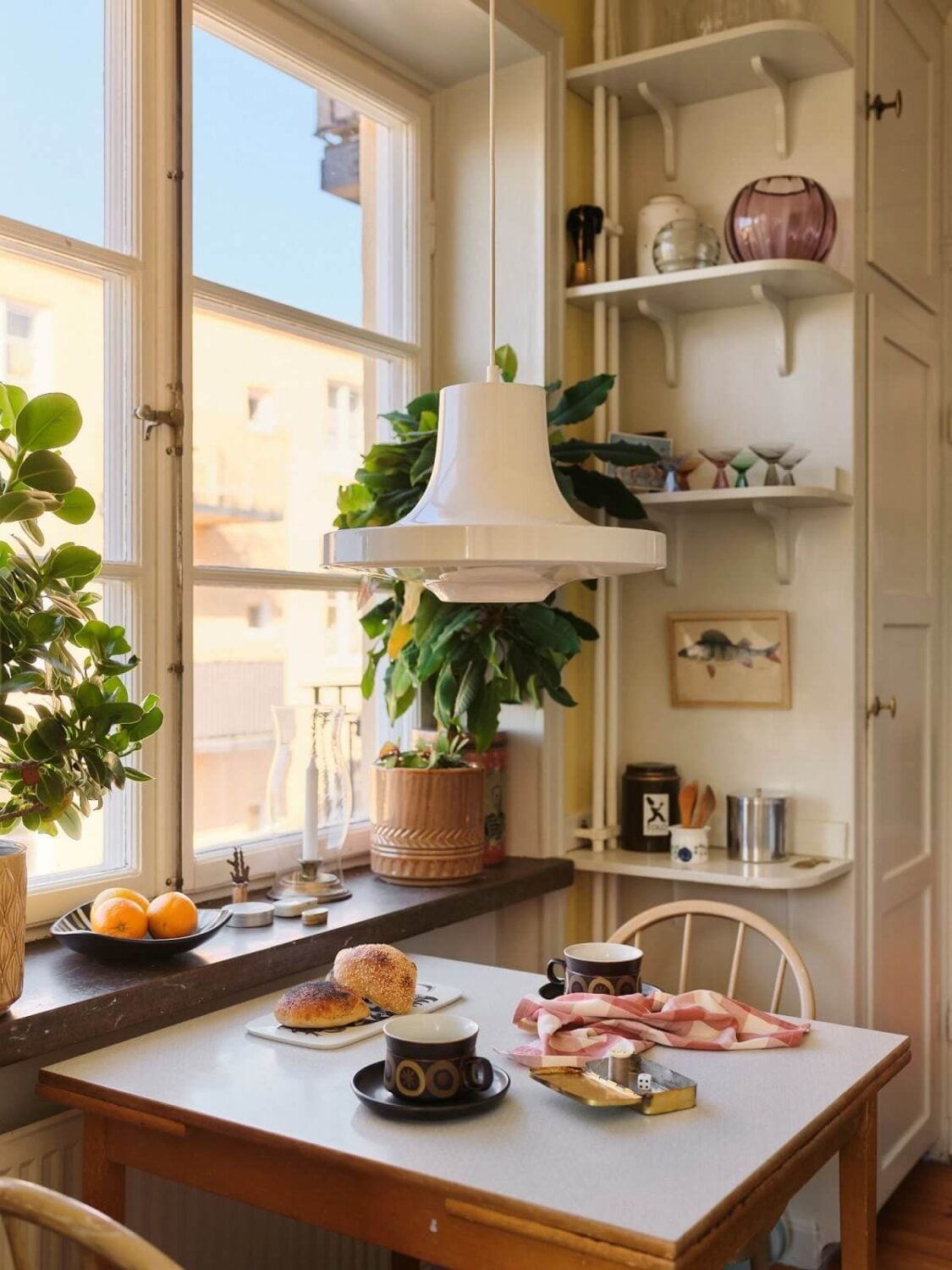 A Charming Small Two-Bedroom Apartment in Stockholm 13 vintage kitchen table