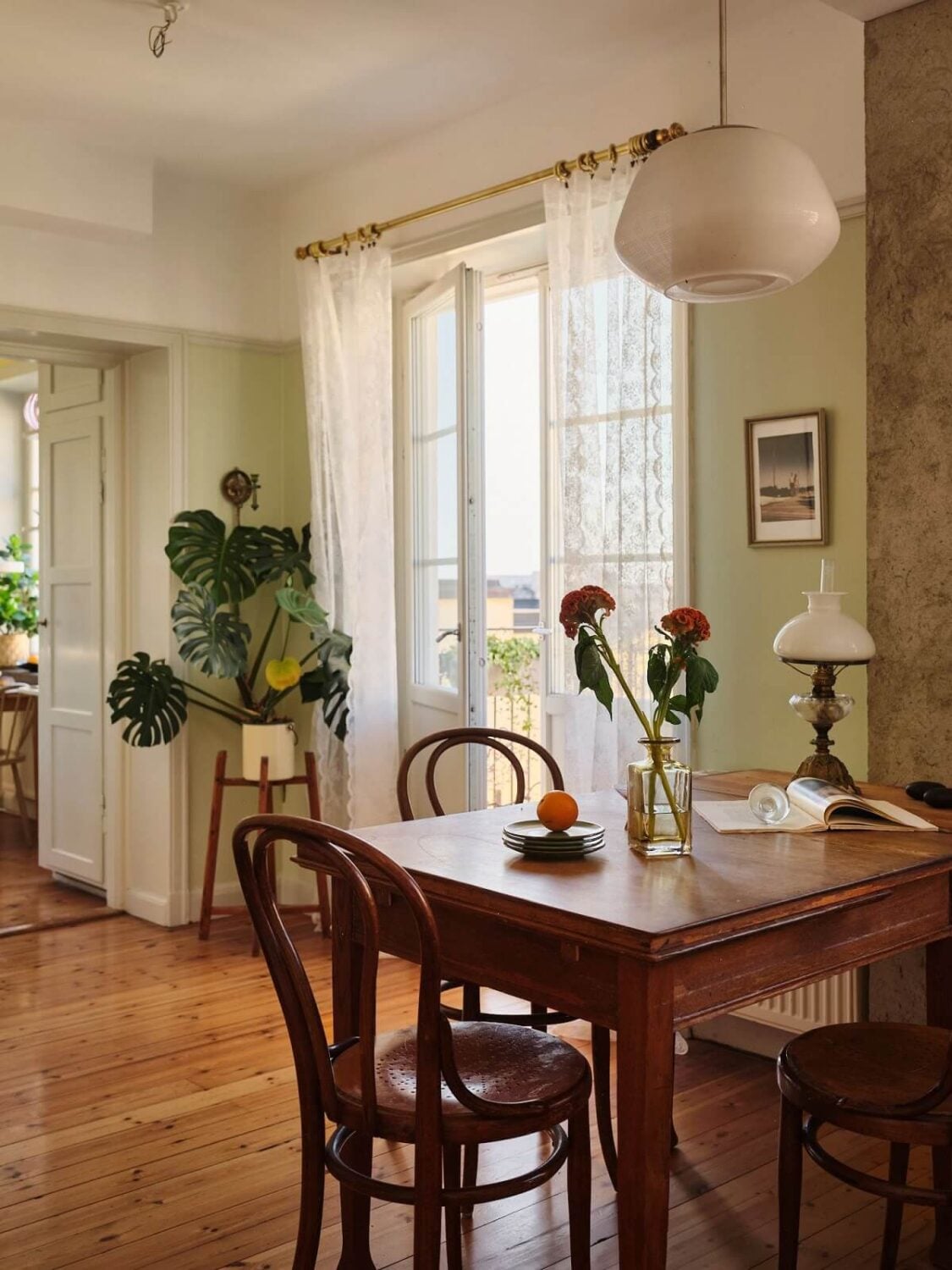 A Charming Small Two-Bedroom Apartment in Stockholm 8 vintage wooden dining table