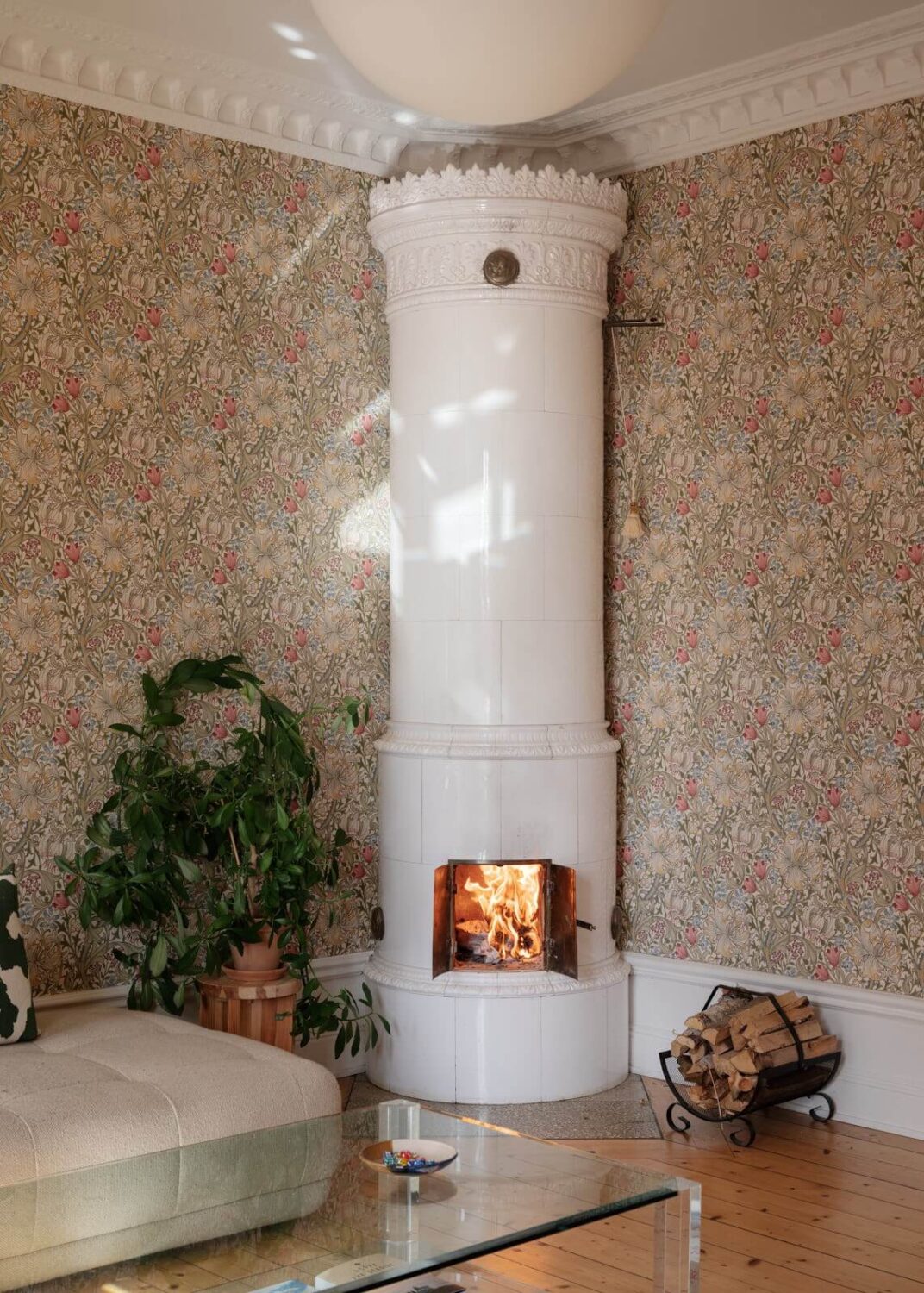 An Apartment with William Morris Wallpaper and a Dull Plum Bedroom 13 wallpapered living room with fireplace