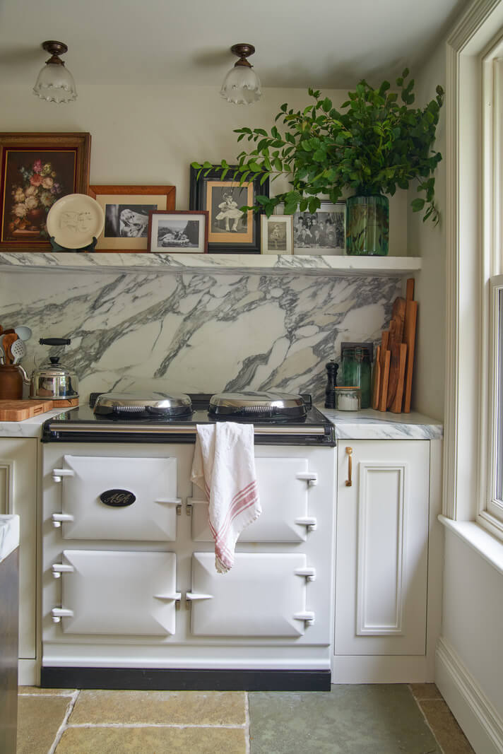 A Luxurious Two-Bedroom Maisonette in Primrose Hill 11 white aga stone kitchen marble backsplash