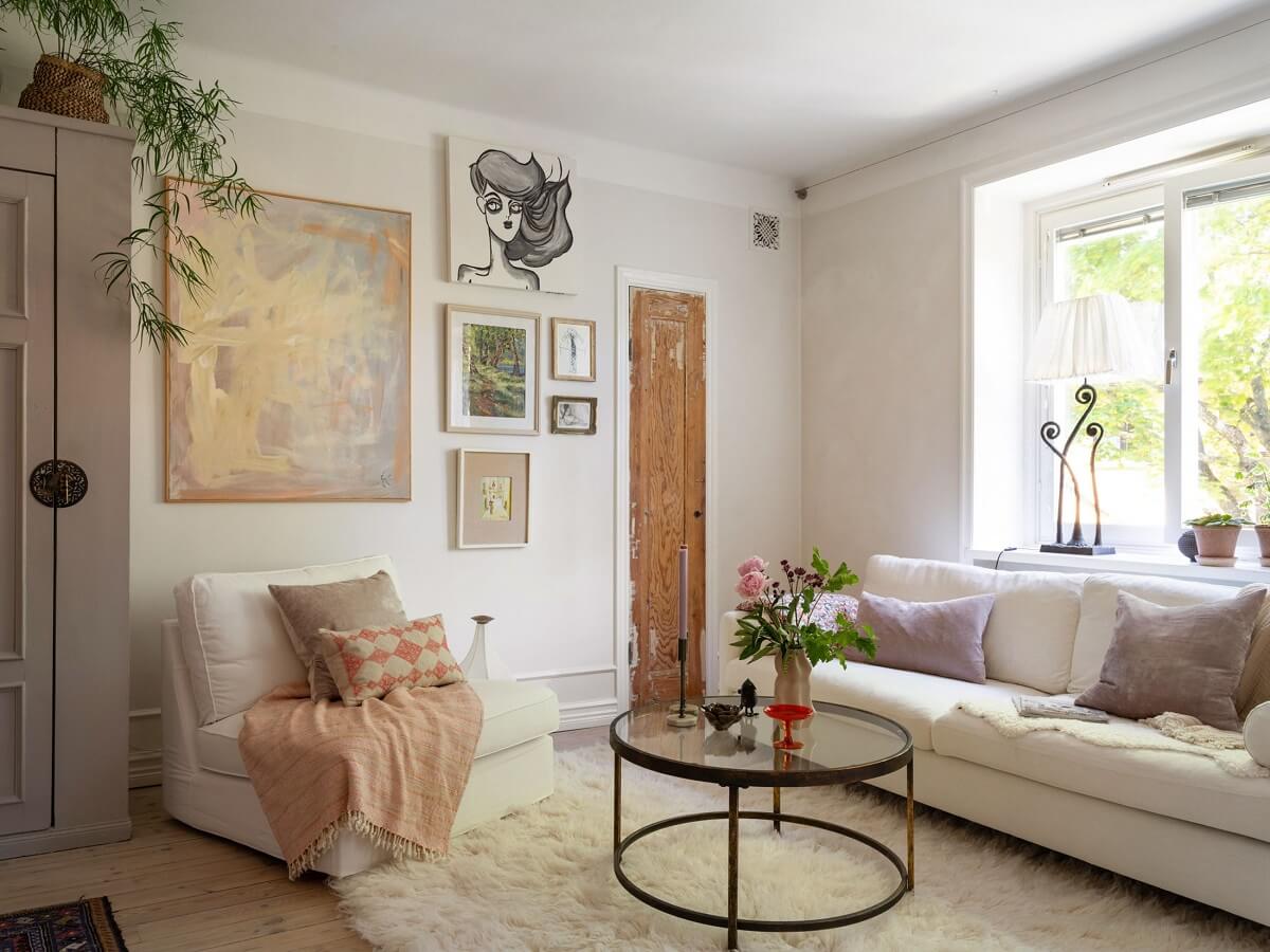 A Light and Well-Planned Apartment in Stockholm 3 white scandi living room