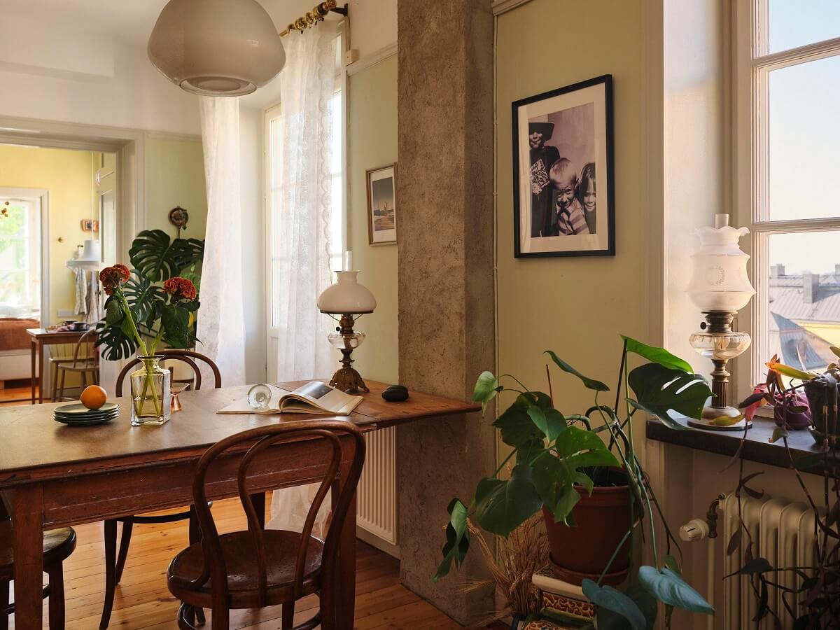 A Charming Small Two-Bedroom Apartment in Stockholm 7 wooden dining table in living room