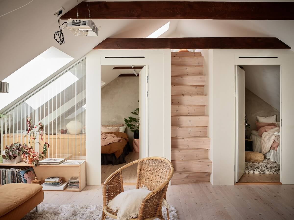 A Light Two-Bedroom Attic Apartment in Sweden 9 attic apartment with wooden beams