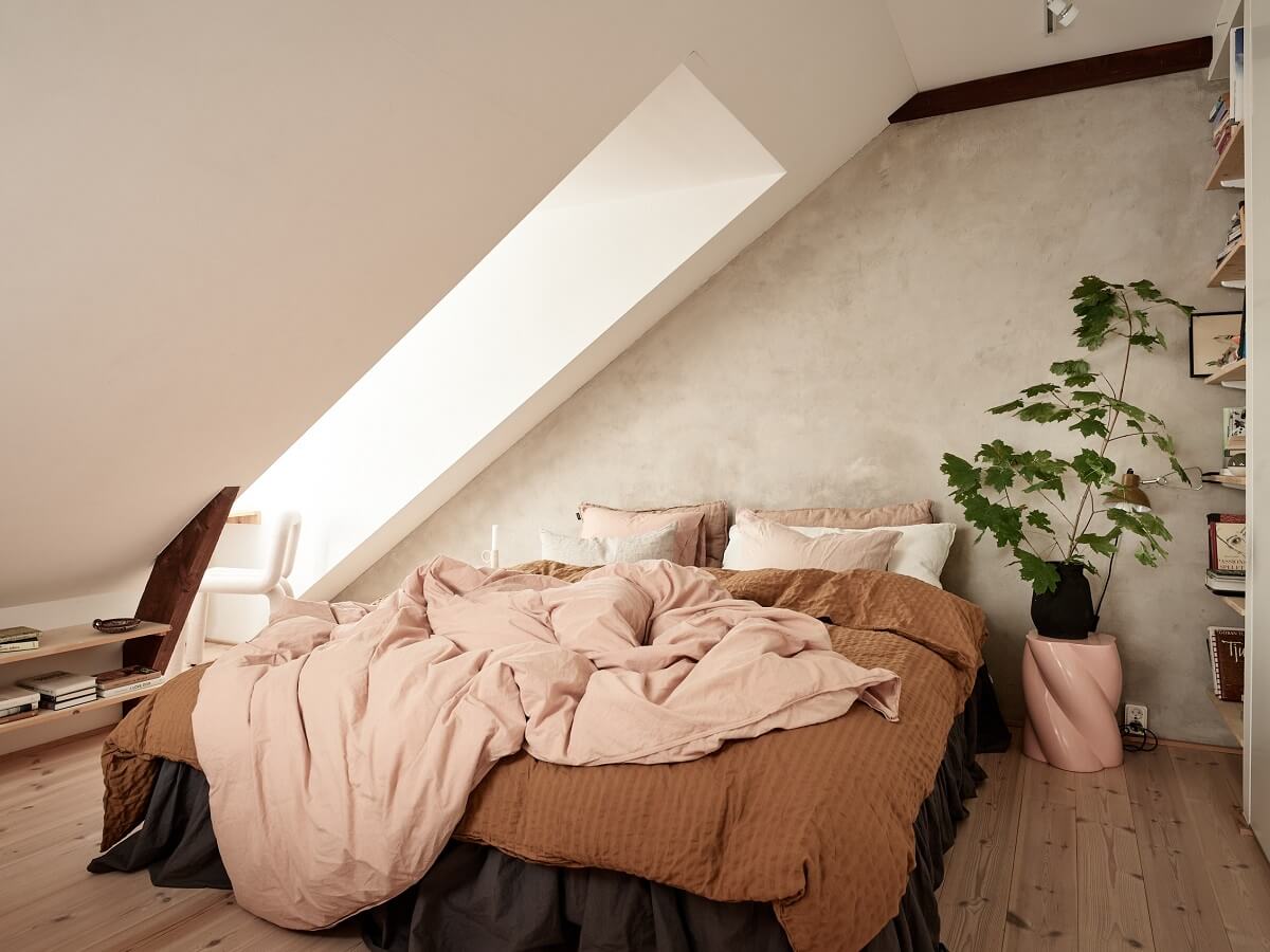 A Light Two-Bedroom Attic Apartment in Sweden 11 attic bedroom