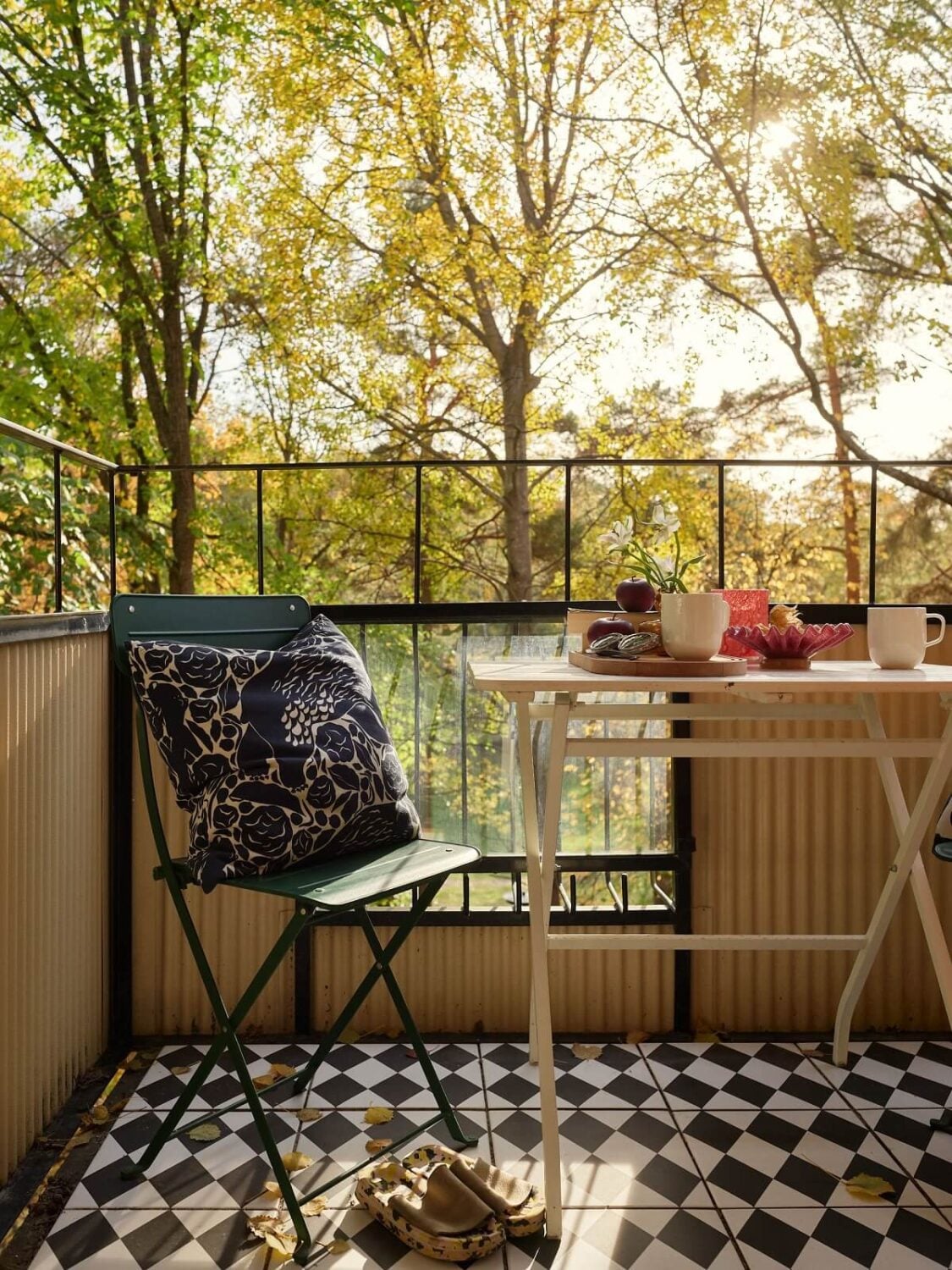 Preserved Midcentury Details and a Red Bedroom in a Stockholm Apartment 7 balcony with black and white tiles