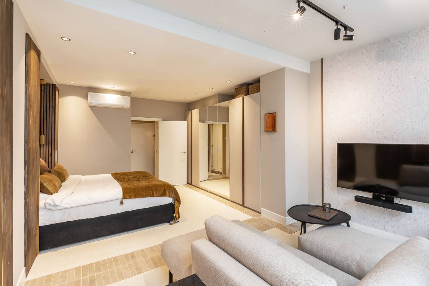 Hotel-Style Interiors in an Amsterdam Canal House 21 basement bedroom with sitting area