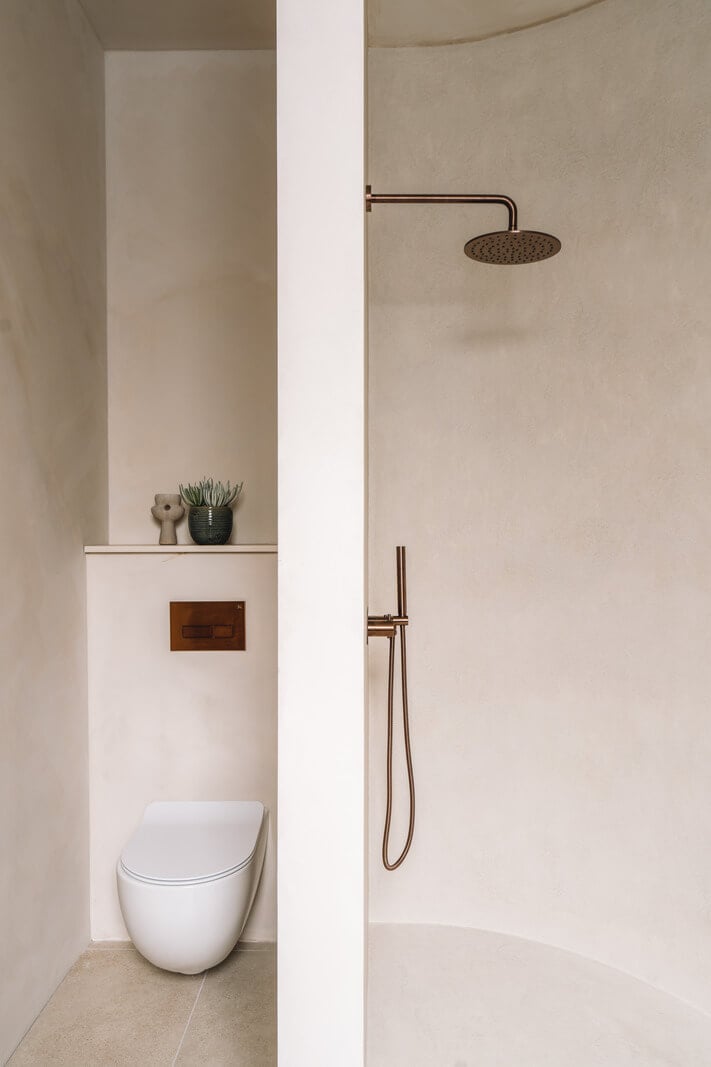 Contemporary Interiors with Limewash Walls in an Old School Building 15 bathroom with curved shower room
