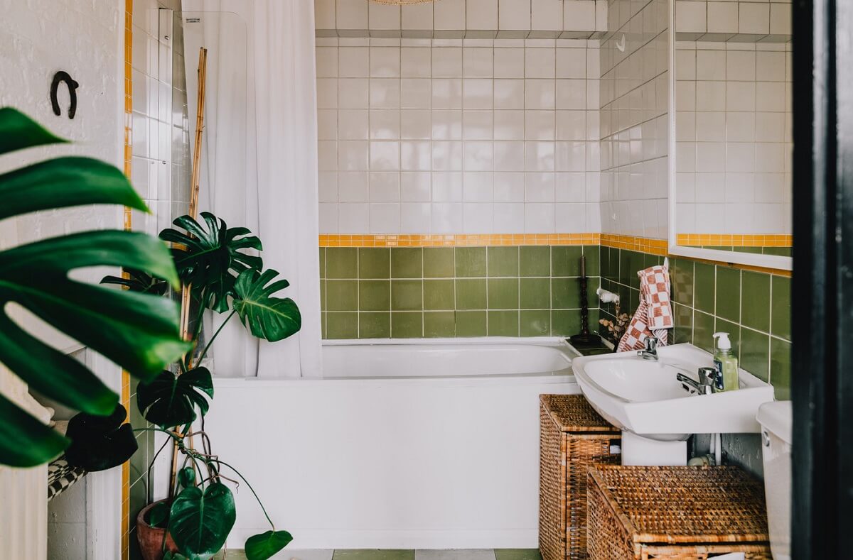 Period Details in a Cozy London Apartment in a Victorian Tenement Building 13 bathroom with green tiles