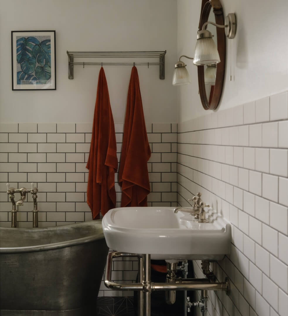 Nature-Inspired Colors in an Extended East London Home 14 bathroom with white subway tiles