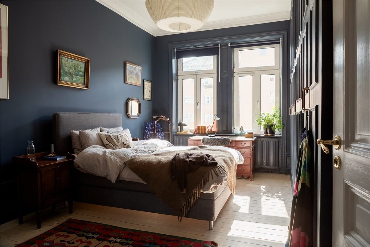 A Turn-of-the-Century Apartment with a Dark Blue Bedroom - Revisited 17 bedroom dark blue painted walls