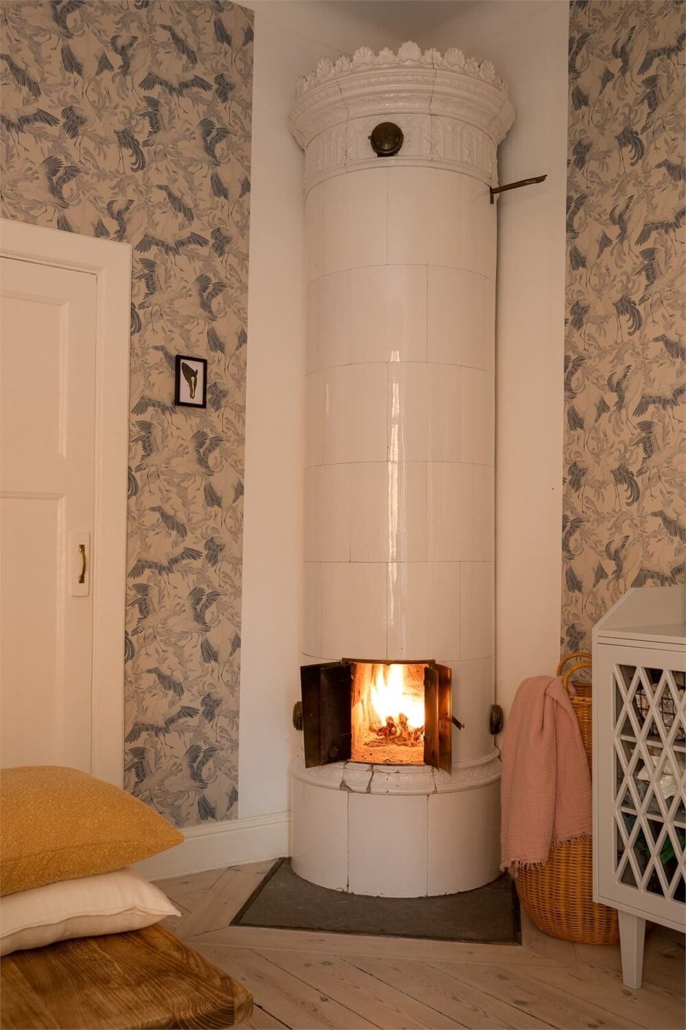 Nature-Inspired Colors in a Charming Stockholm Apartment 17 bedroom fireplace