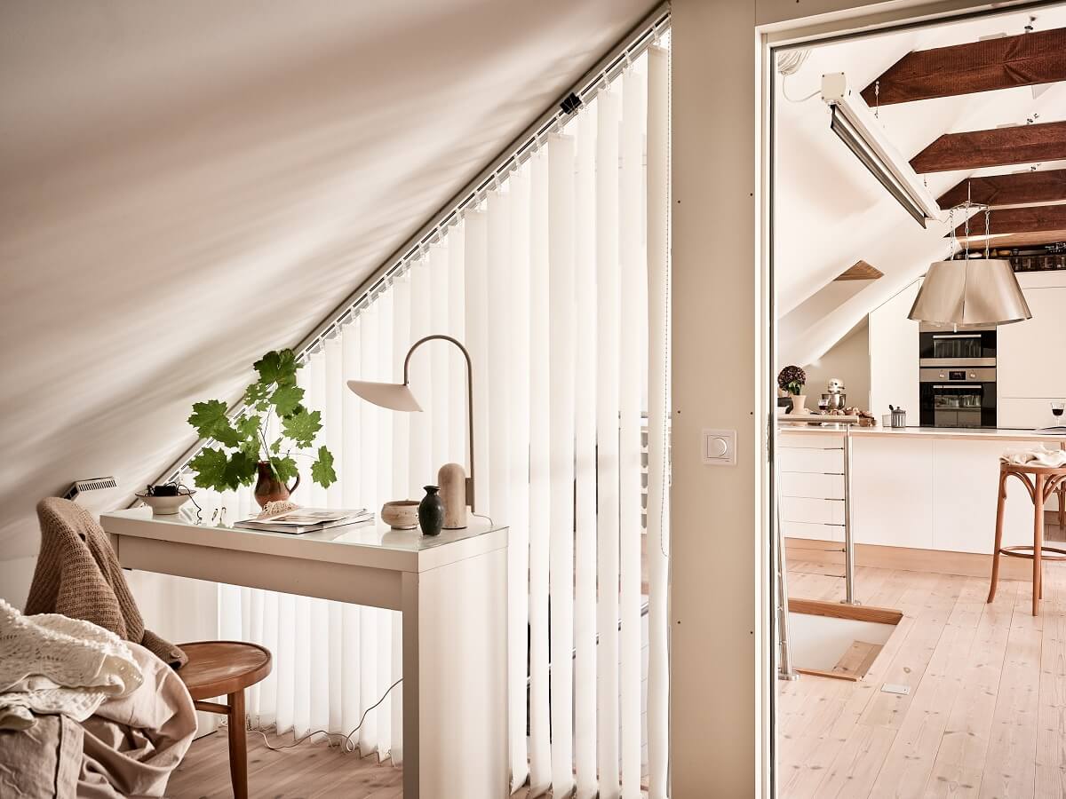 A Light Two-Bedroom Attic Apartment in Sweden 16 bedroom glass wall desk