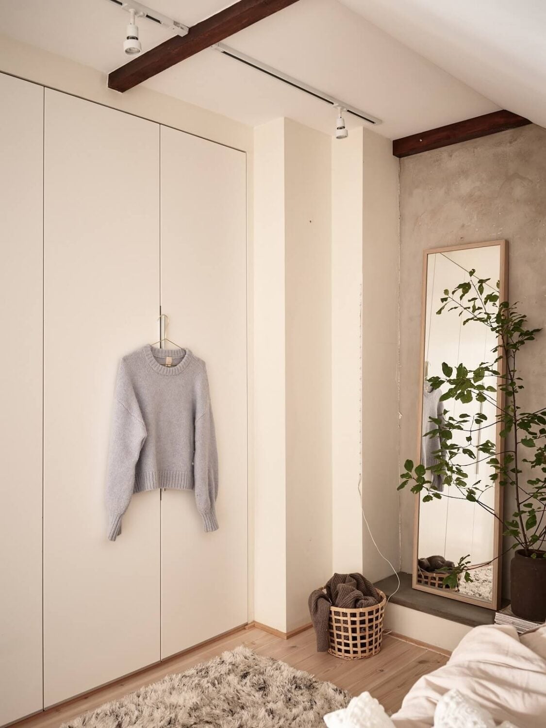 A Light Two-Bedroom Attic Apartment in Sweden 15 bedroom white built in wardrobes