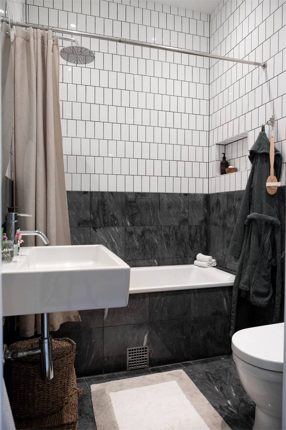 A Turn-of-the-Century Apartment with a Dark Blue Bedroom - Revisited 23 black and white bathroom