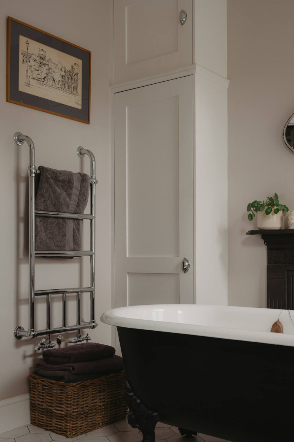 Original Details and a Modern Extension in a London House 26 black freestanding bath