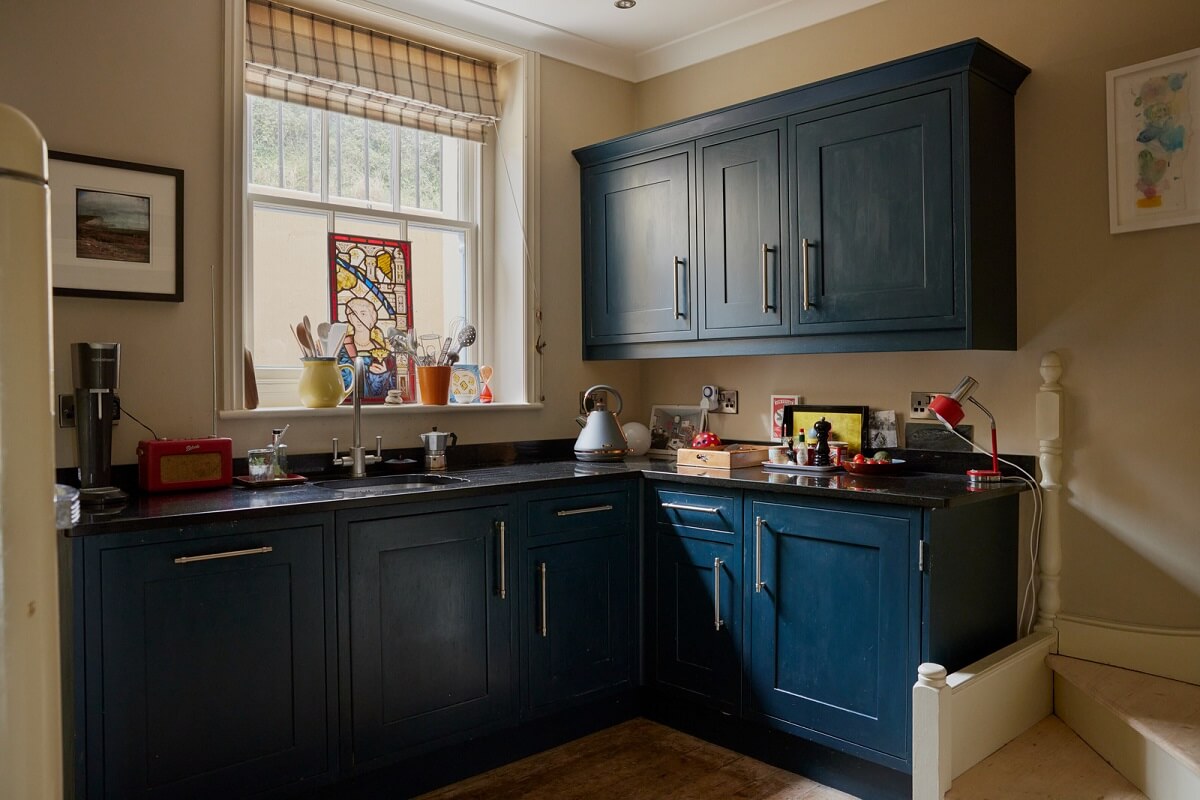 Muted Tones and an Orangery in a Victorian Coastal House 10 blue painted kitchen cabinets