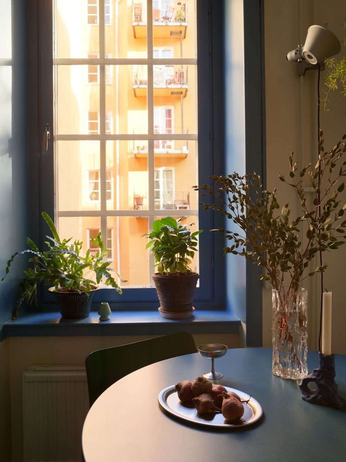 Best of 2024: Loft & Studio Apartments 4 blue window frames and table kitchen nordroom
