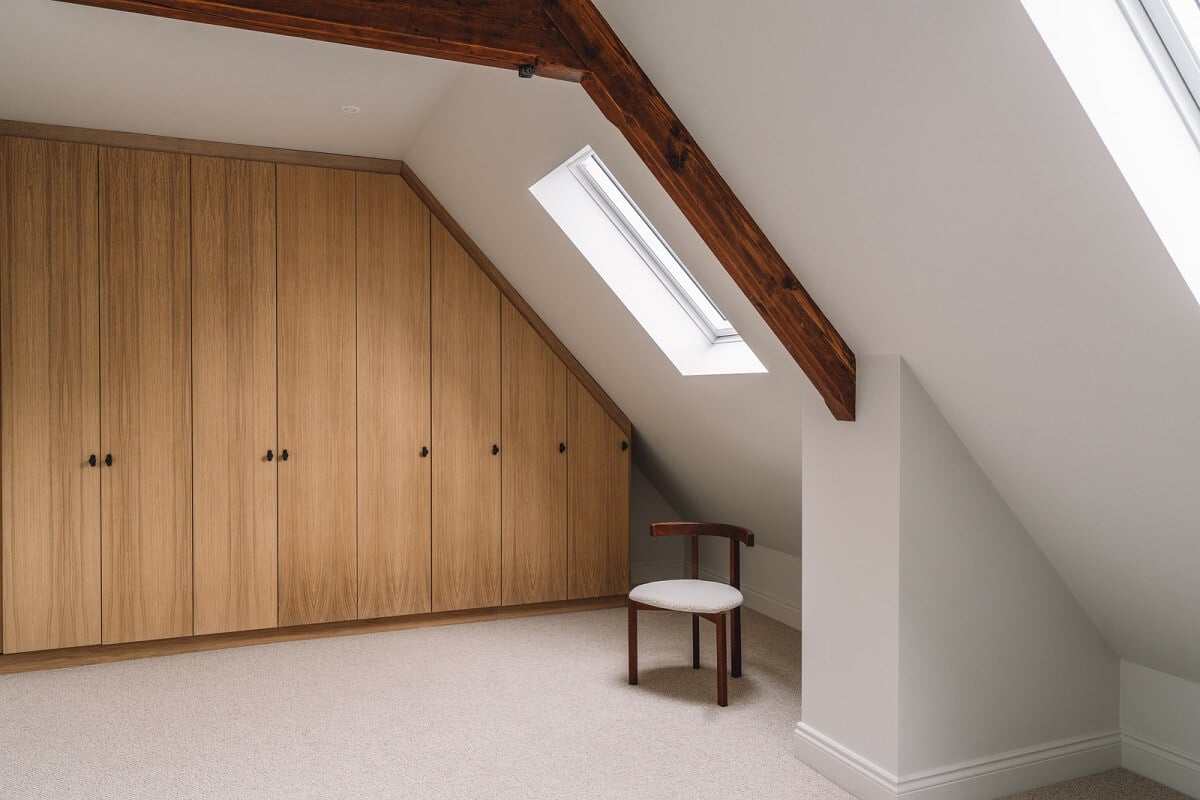 Contemporary Interiors with Limewash Walls in an Old School Building 19 built in wardrobes attic room