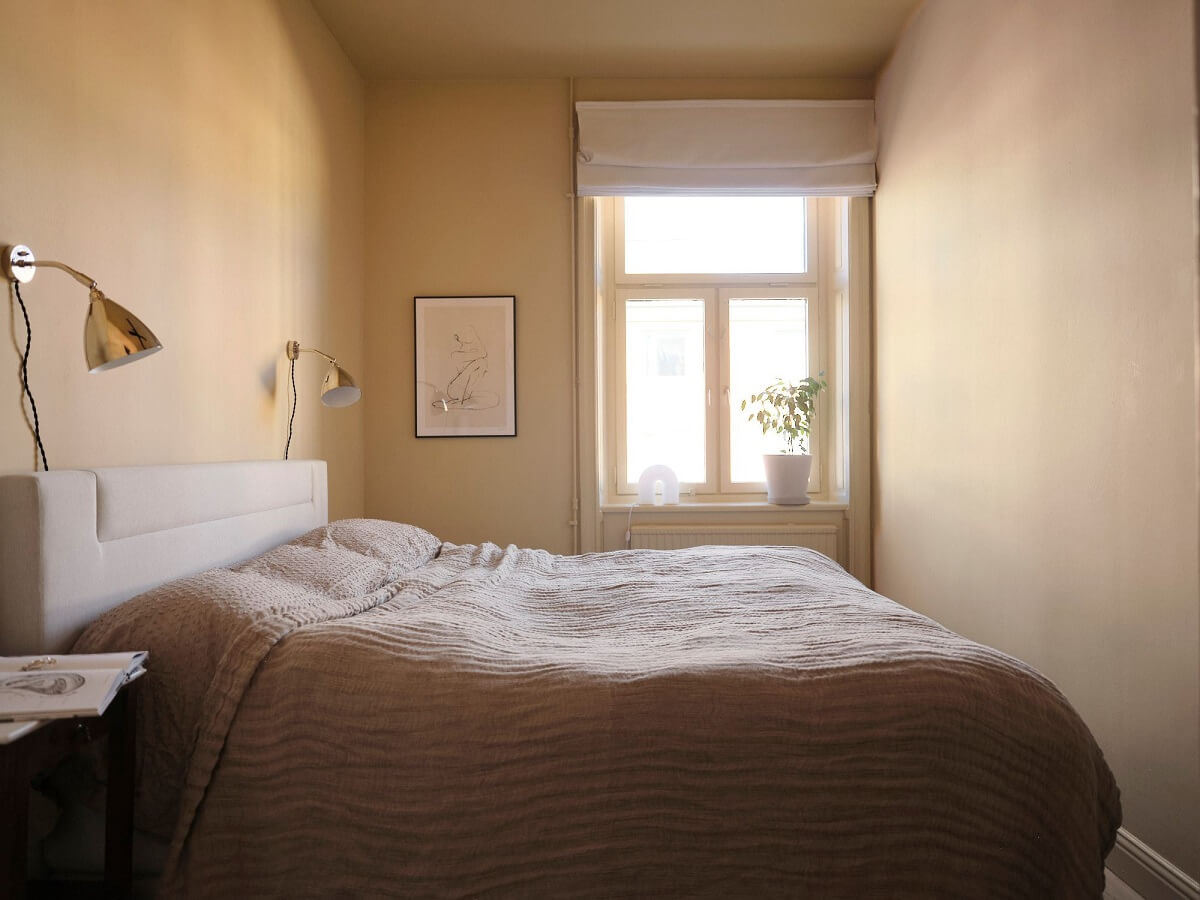 A Light Pastel Yellow and Pink Apartment in Stockholm 19 calm bedroom