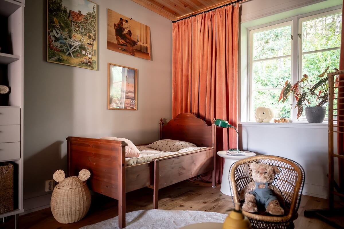 A Warm Scandinavian Log House with a Green Roof 20 childrens bedroom vintage wooden bed
