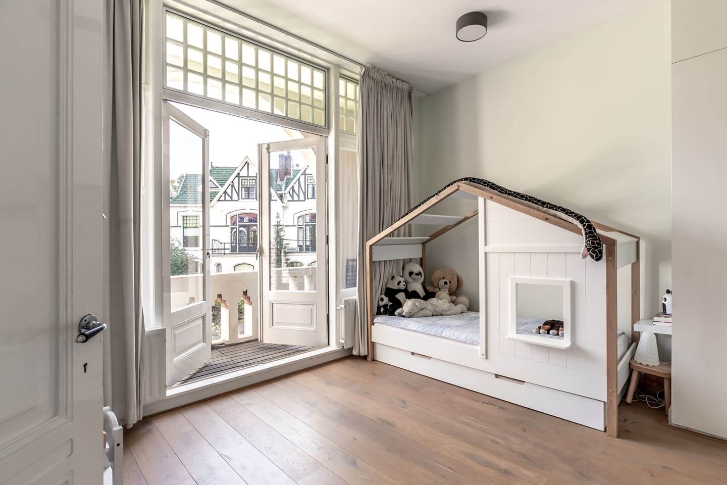 A Beautiful Monumental Villa with Green Color Accents 21 childrens room with balcony
