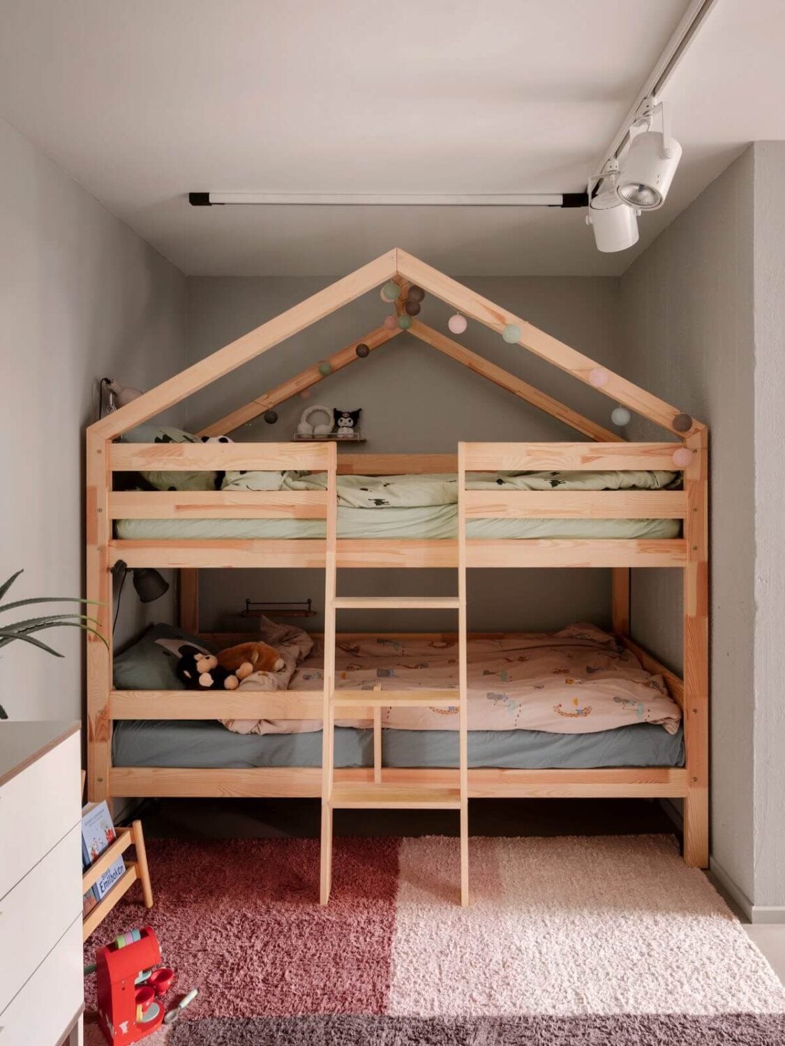 A Modern Industrial Basement Apartment in Sweden 21 childrens room with wooden bunk bed A Modern Industrial Basement Apartment in Sweden