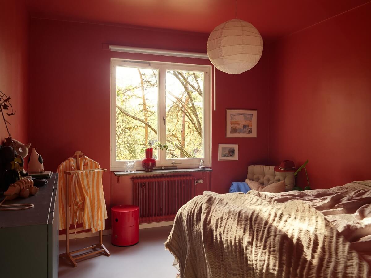 Preserved Midcentury Details and a Red Bedroom in a Stockholm Apartment 15 color drenched red bedroom