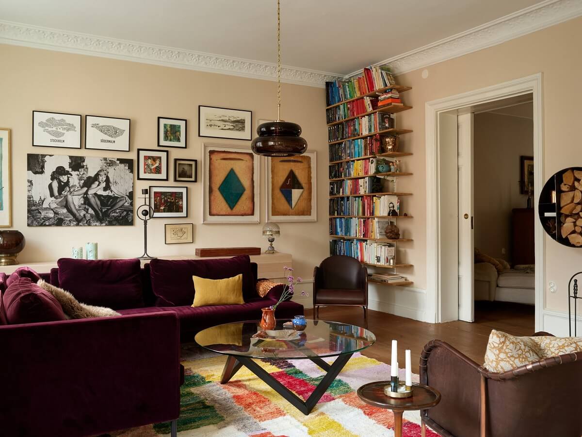 Beautiful Historic Details in a Large and Inviting Family Apartment 1 colorful rug and sofa scandi living room
