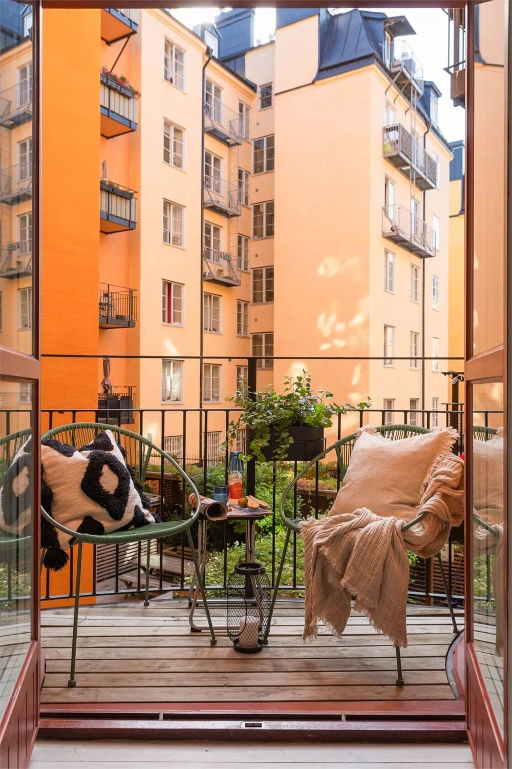 Nature-Inspired Colors in a Charming Stockholm Apartment 15 courtyard balcony