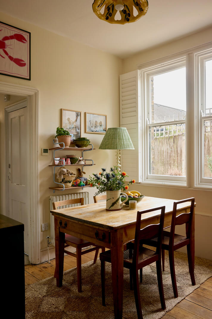 A Beautiful Color Palette in a Victorian London Apartment 7 cozy wooden kitche table