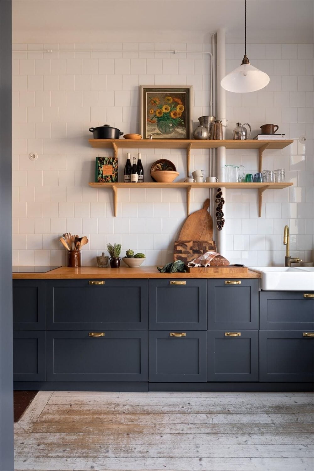 A Turn-of-the-Century Apartment with a Dark Blue Bedroom - Revisited 12 dark blue kitchen cabinets